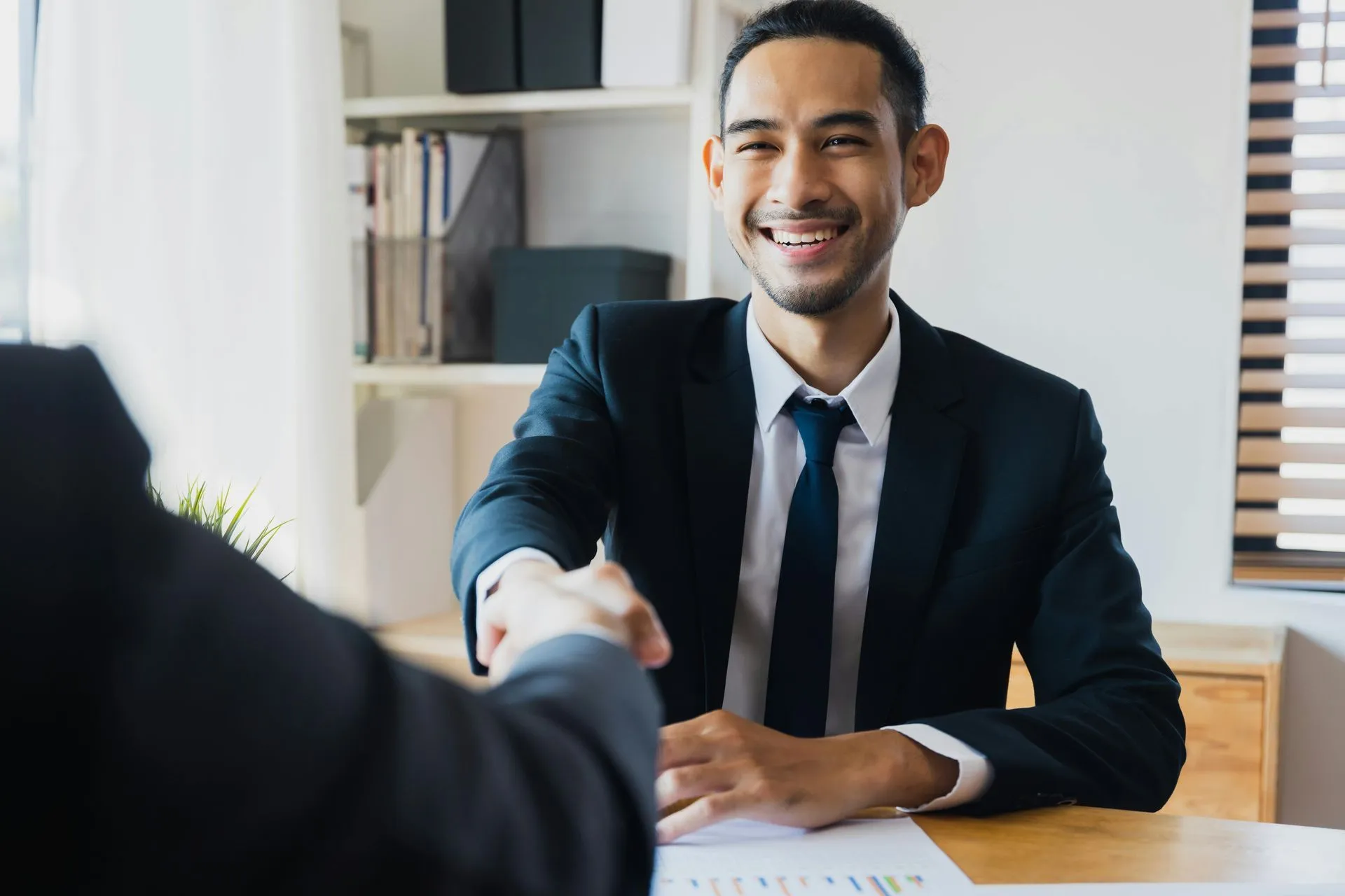 Business professionals meeting around a table for consulting